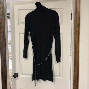 Michael Kors black turtleneck sweater dress with chain belt